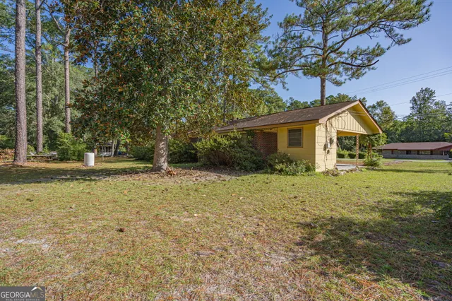 a house view with a outdoor space