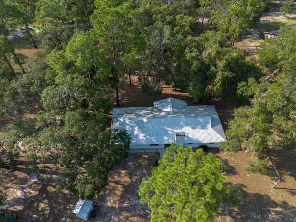 a view of a livingroom with wooden floor