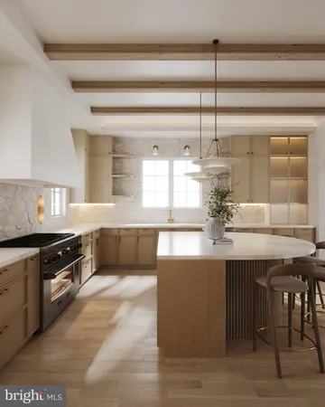 a kitchen with kitchen island granite countertop a sink cabinets and stainless steel appliances