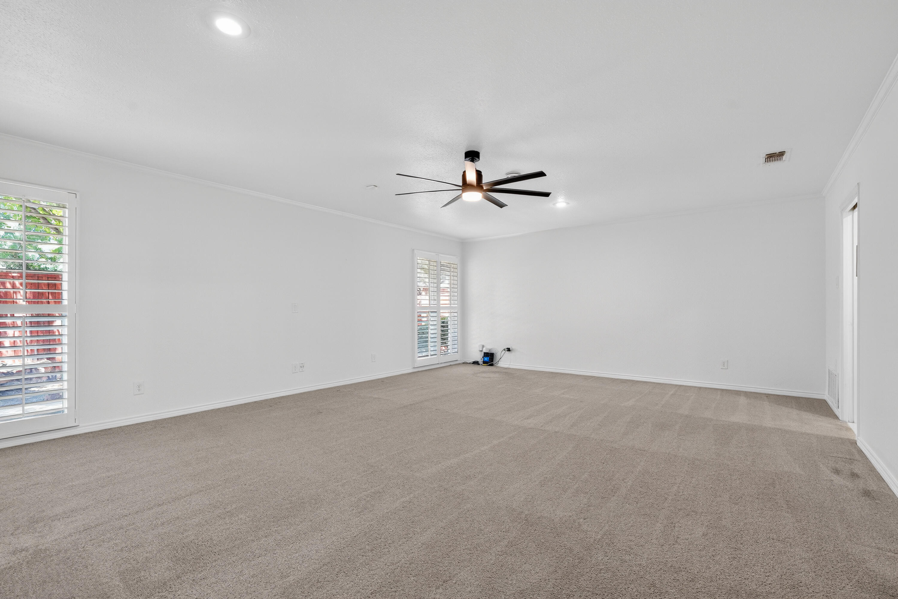 4616 9th Street Lubbock, TX 79416 - Photo 15 of 53 a view of an empty room with a window