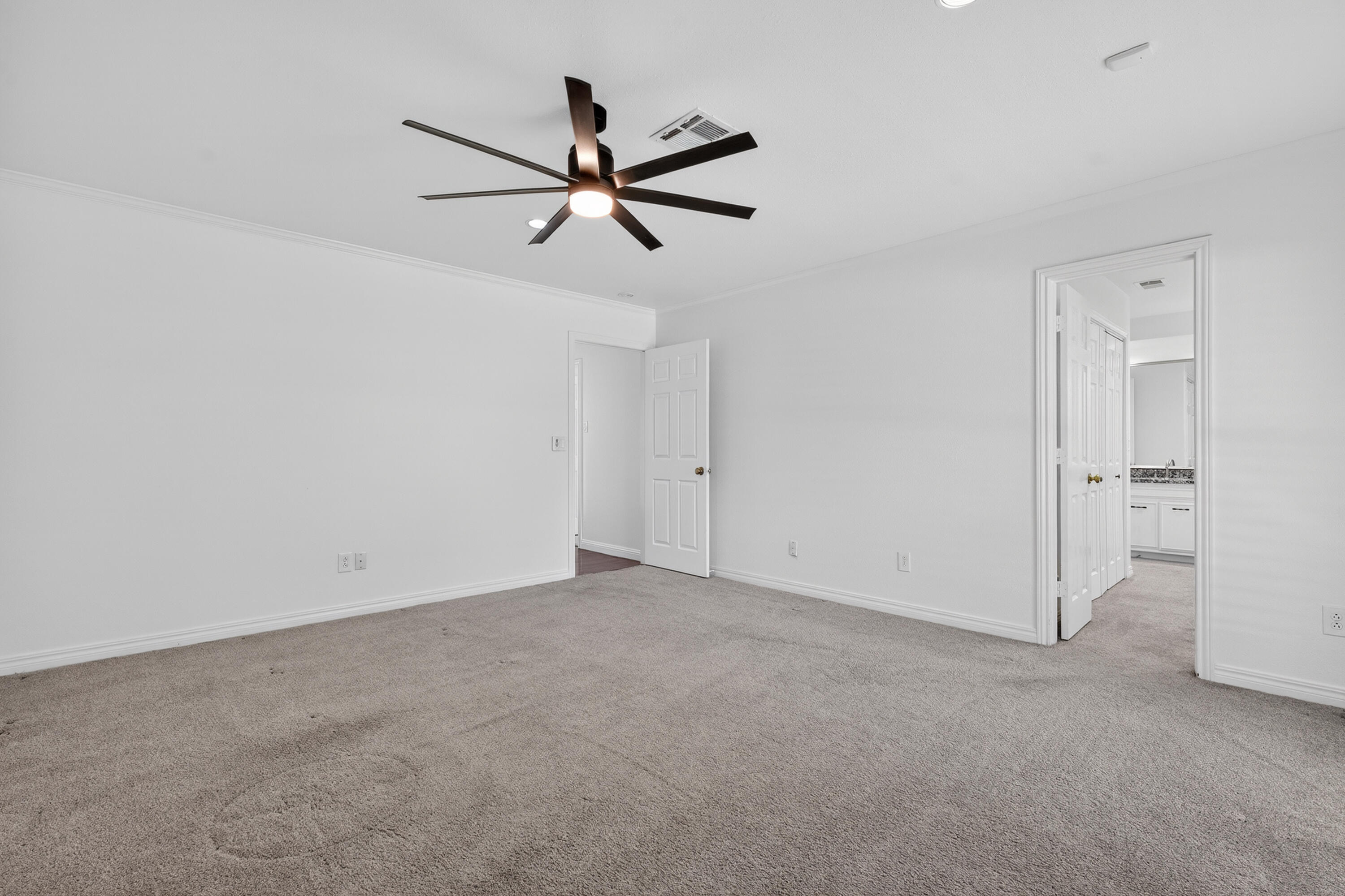 4616 9th Street Lubbock, TX 79416 - Photo 39 of 53 a view of a big room with carpet