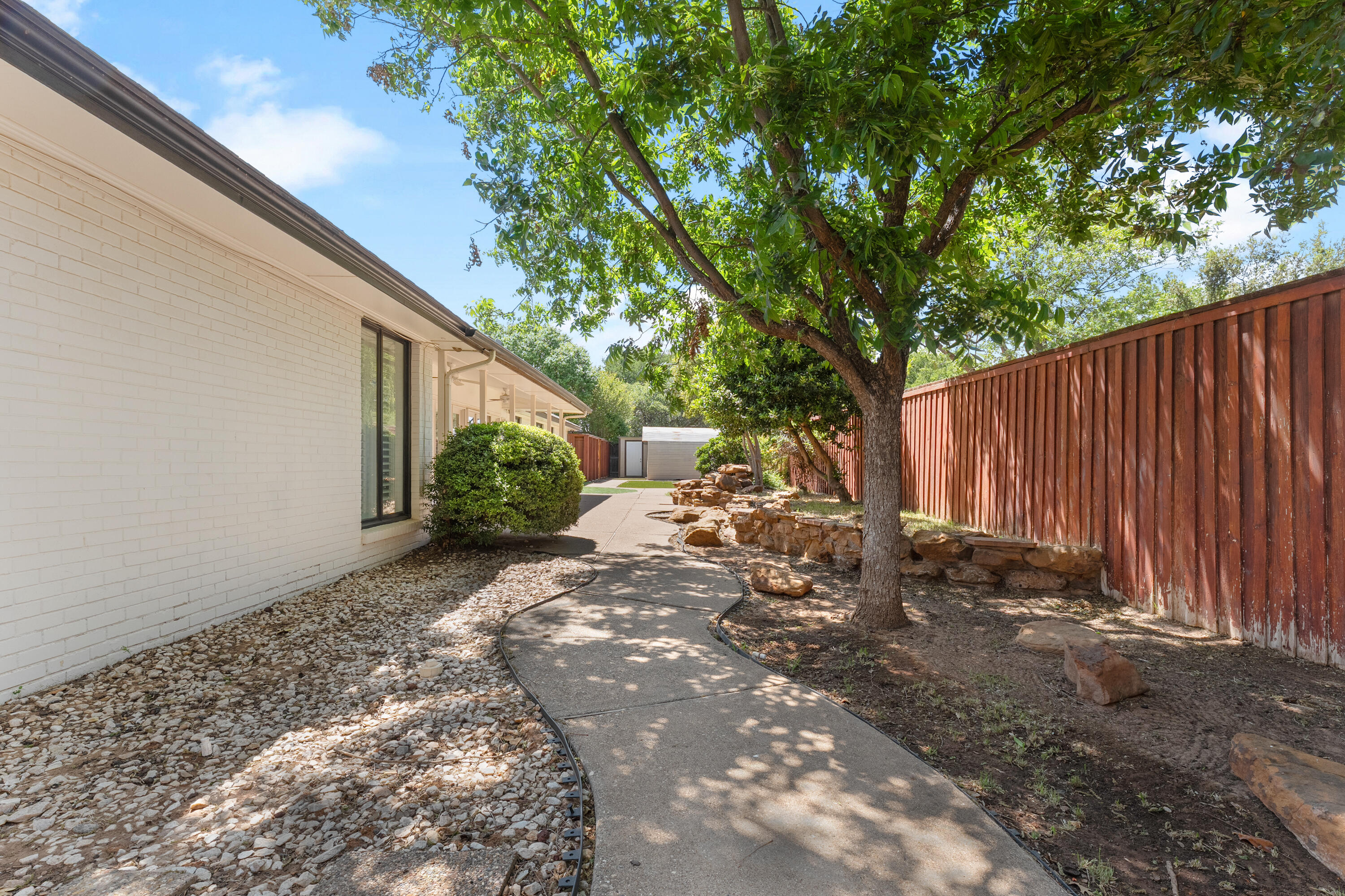 4616 9th Street Lubbock, TX 79416 - Photo 48 of 53 a view of a back yard of the house