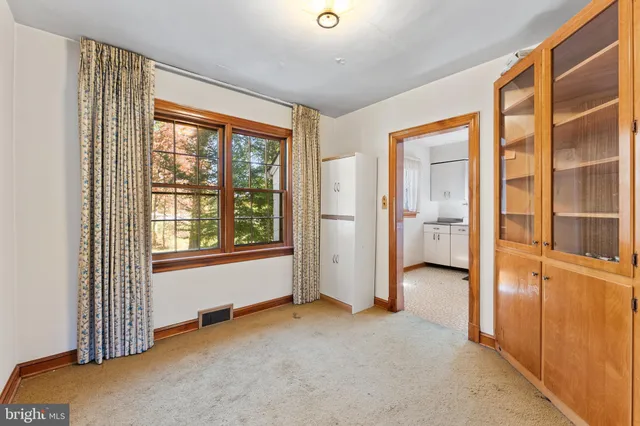 an empty room with windows