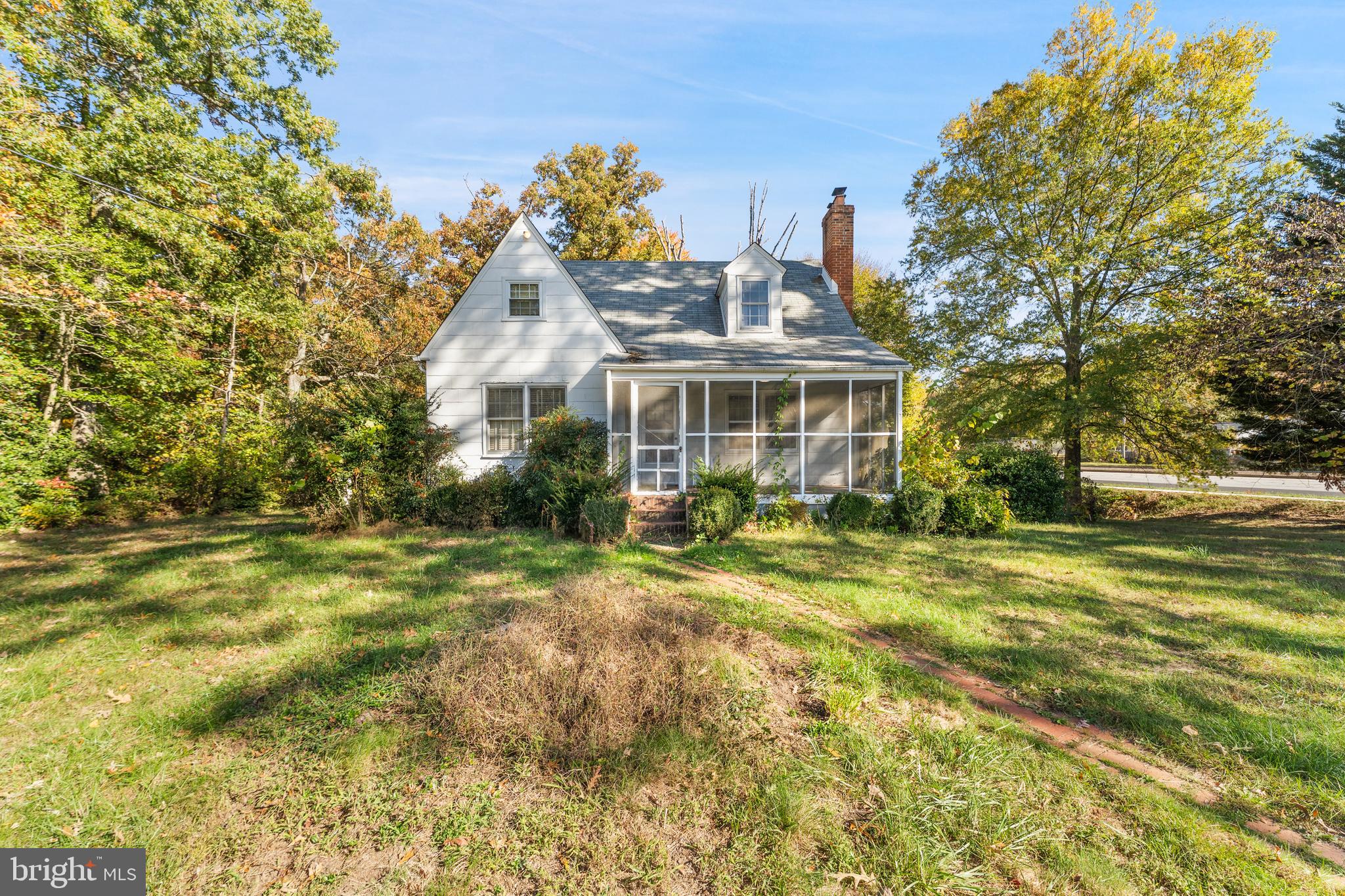 12606 Sub-Station Road Waldorf, MD 20601 - Photo 2 of 44 a front view of a house with a garden
