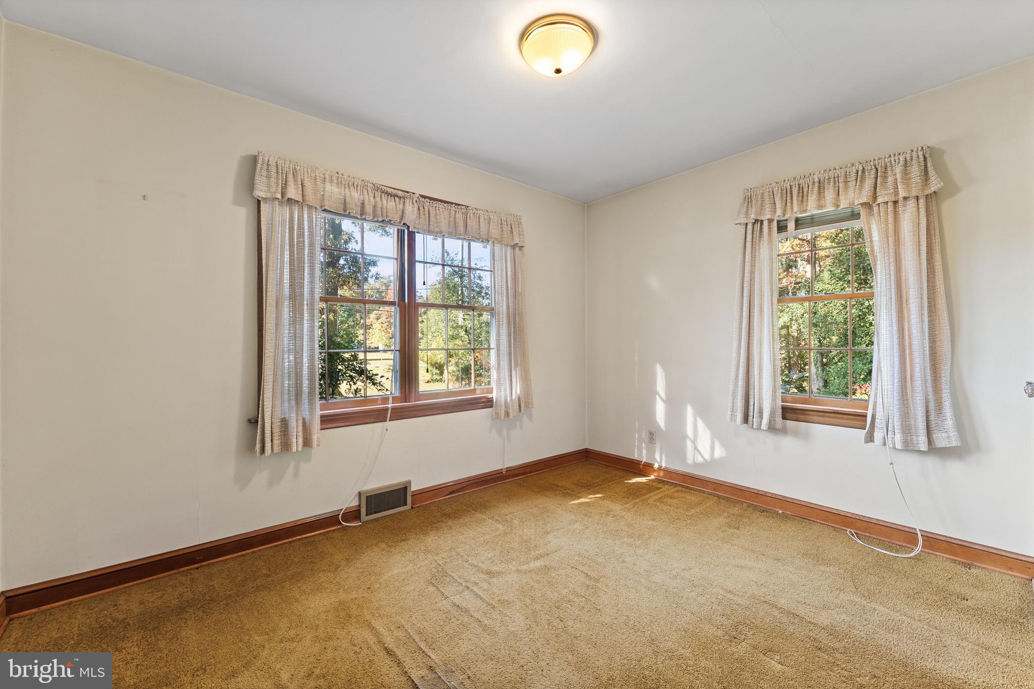 12606 Sub-Station Road Waldorf, MD 20601 - Photo 28 of 44 a view of an empty room with a window