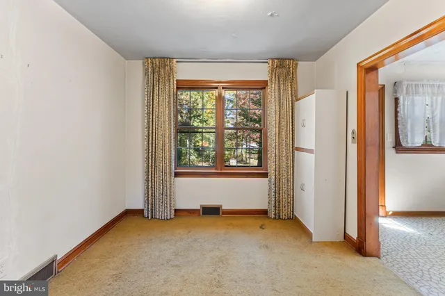 an empty room with windows