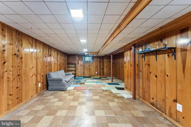 a view of outdoor space with wooden walls