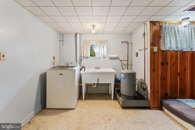 a room with furniture and a chandelier