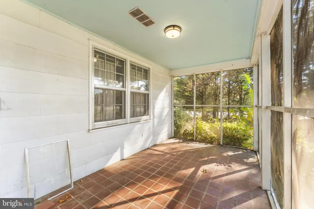 a view of a porch with a backyard