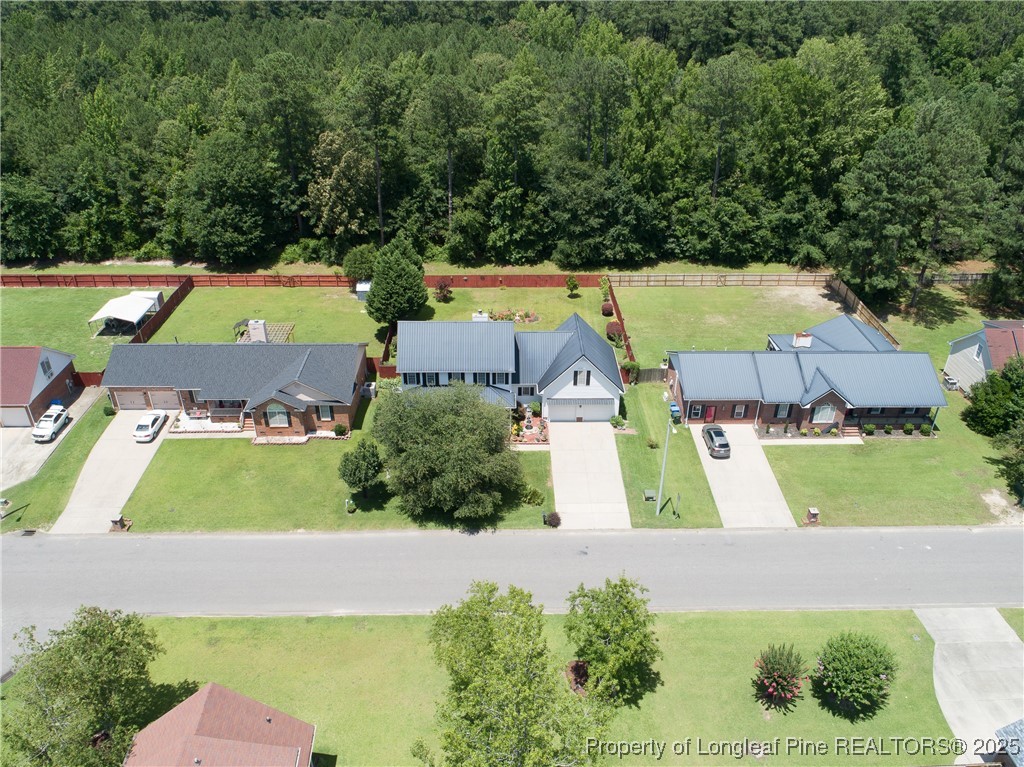 6528 Foxberry Road Fayetteville, NC 28314 - Photo 48 of 50 an aerial view of residential houses with outdoor space