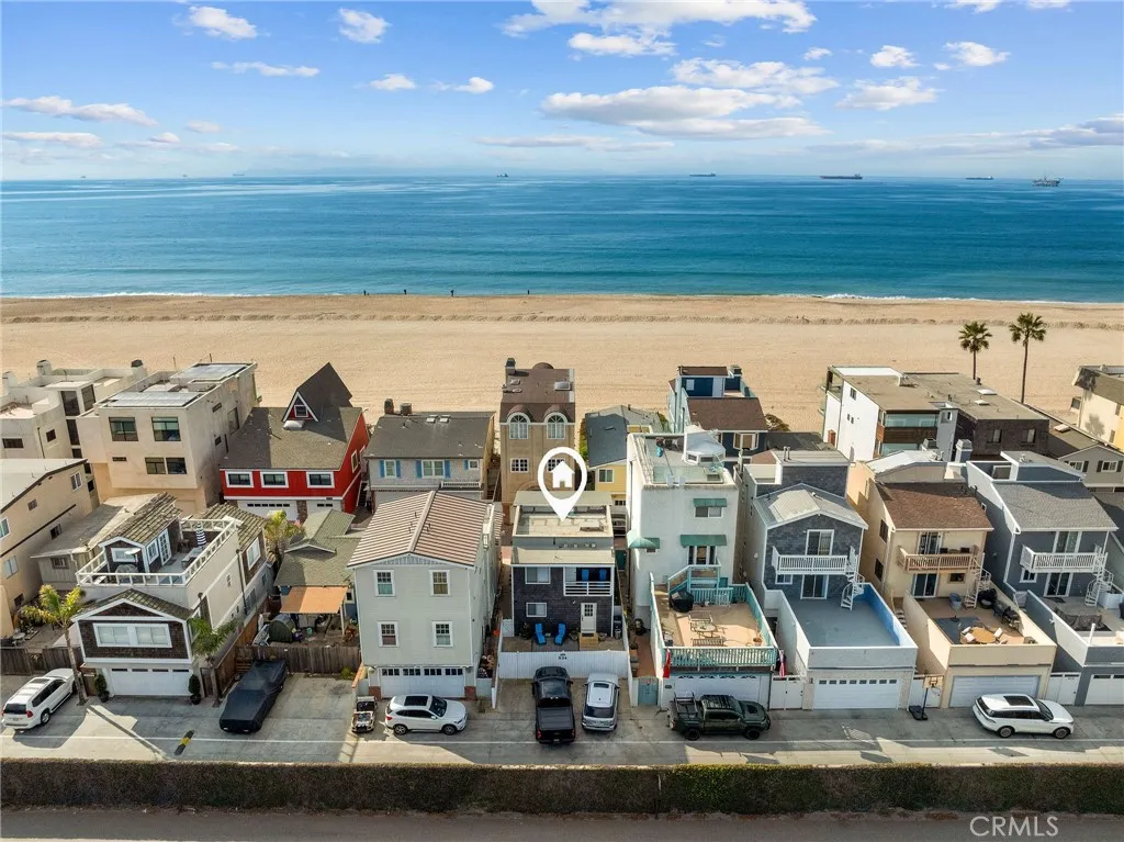 24 Surfside Avenue Surfside, CA 90743 - Photo 1 of 22 a view of a building with outdoor space