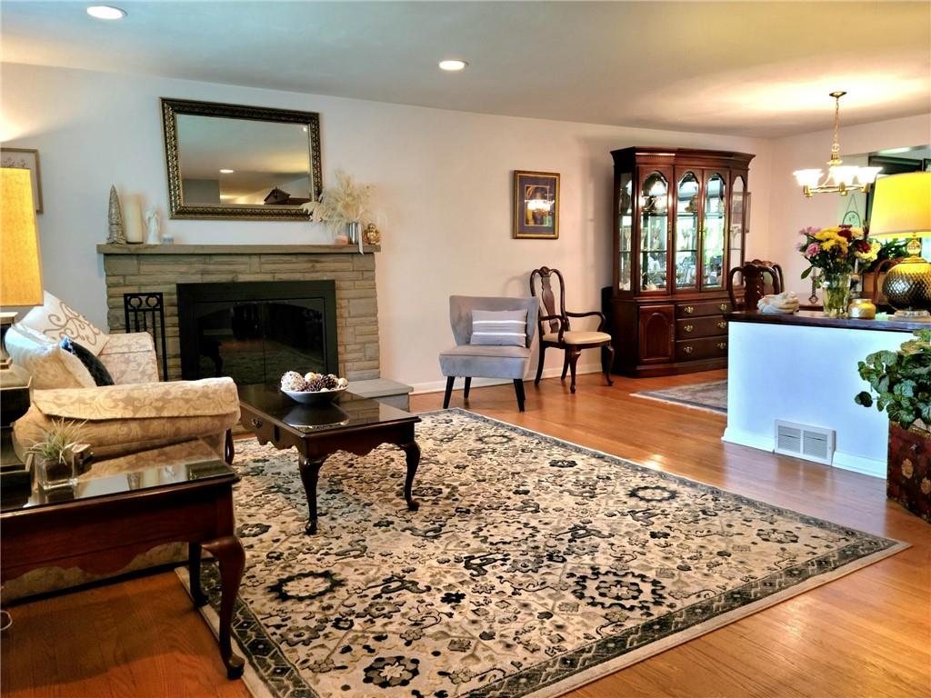 5184 Richland Road Gibsonia, PA 15044 - Photo 4 of 23 a living room with furniture and a fireplace