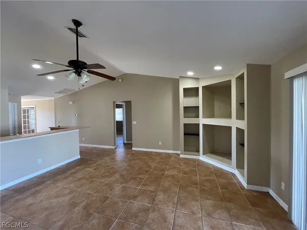 a stove top oven sitting inside of a kitchen