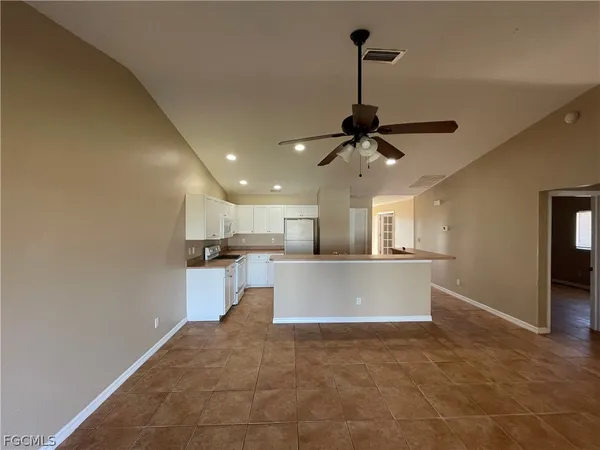 a view of a livingroom with a ceiling fan