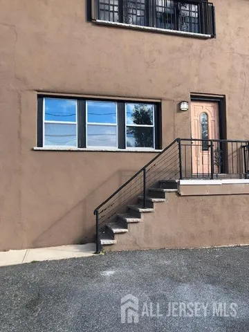 a view of an entryway with stairs