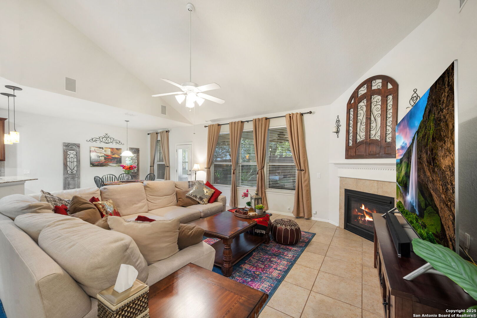 8206 Setting Moon San Antonio, TX 78255 - Photo 27 of 36 a living room with furniture fireplace and flat screen tv
