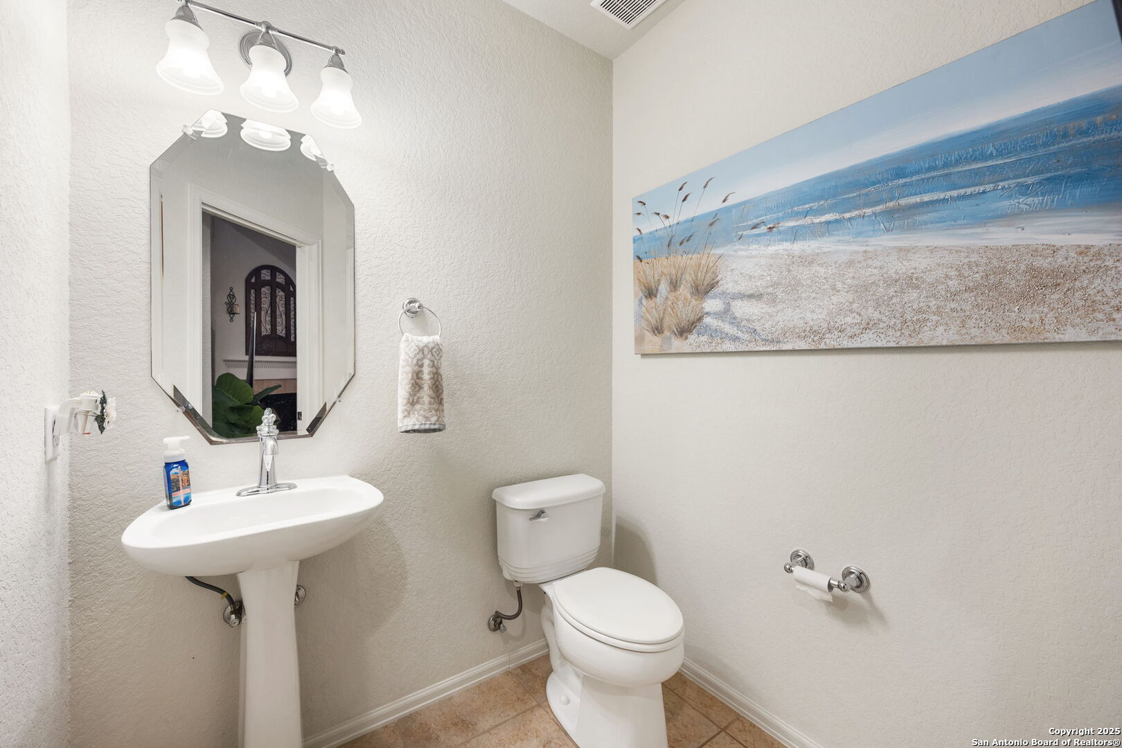 8206 Setting Moon San Antonio, TX 78255 - Photo 28 of 36 a bathroom with a toilet sink and mirror