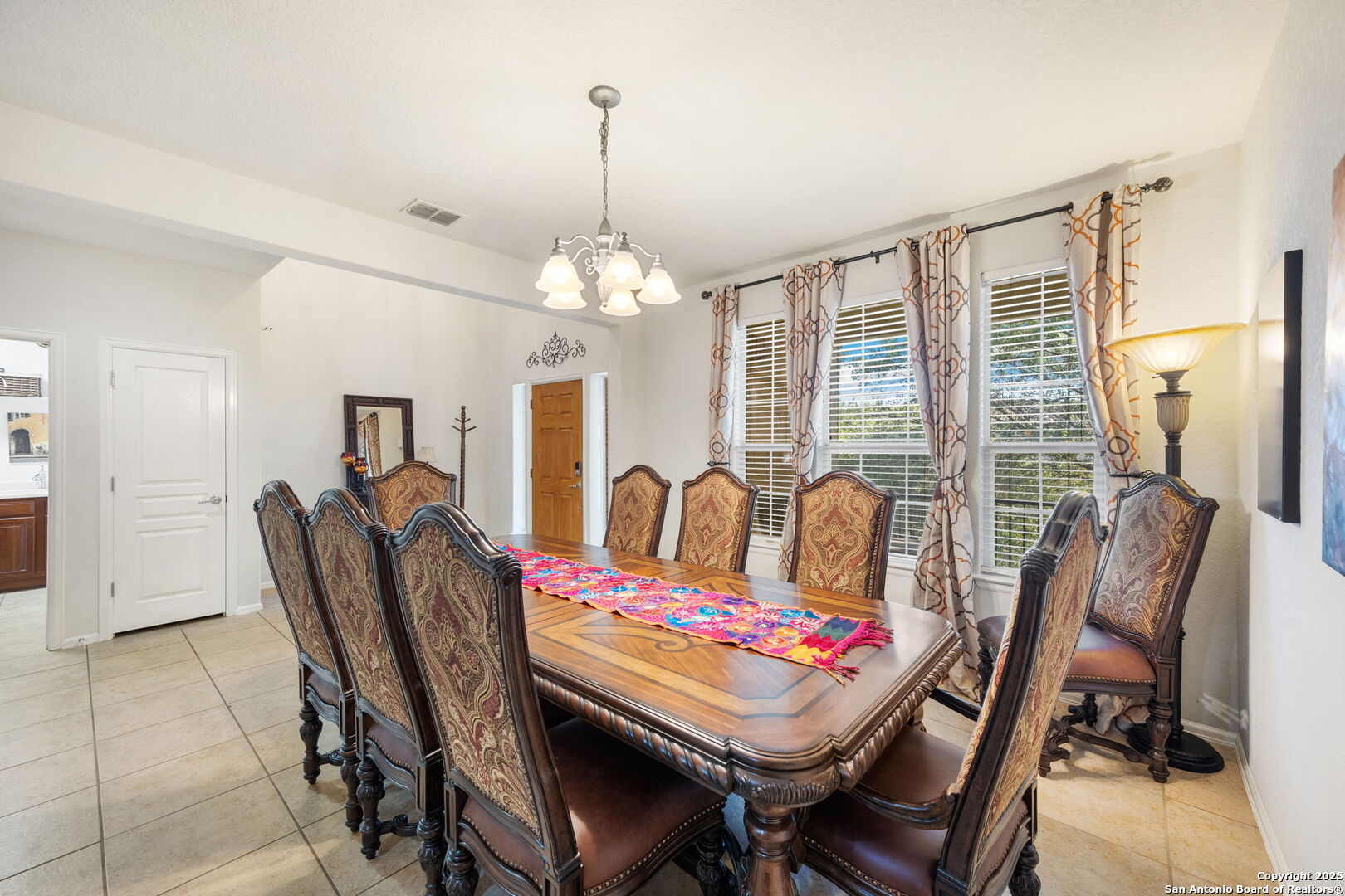8206 Setting Moon San Antonio, TX 78255 - Photo 3 of 36 a view of a dining room with furniture window and outside view