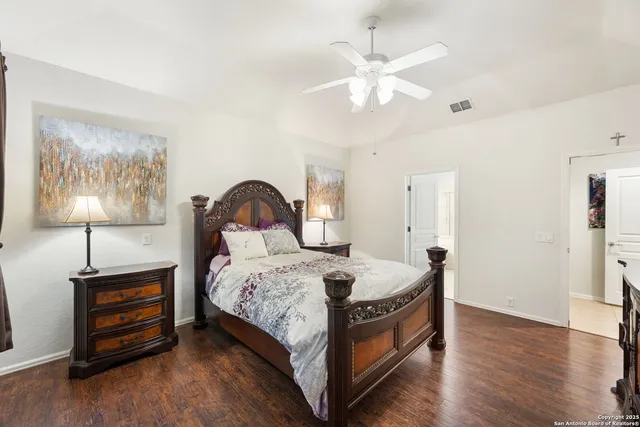 a bathroom with a sink vanity and mirror