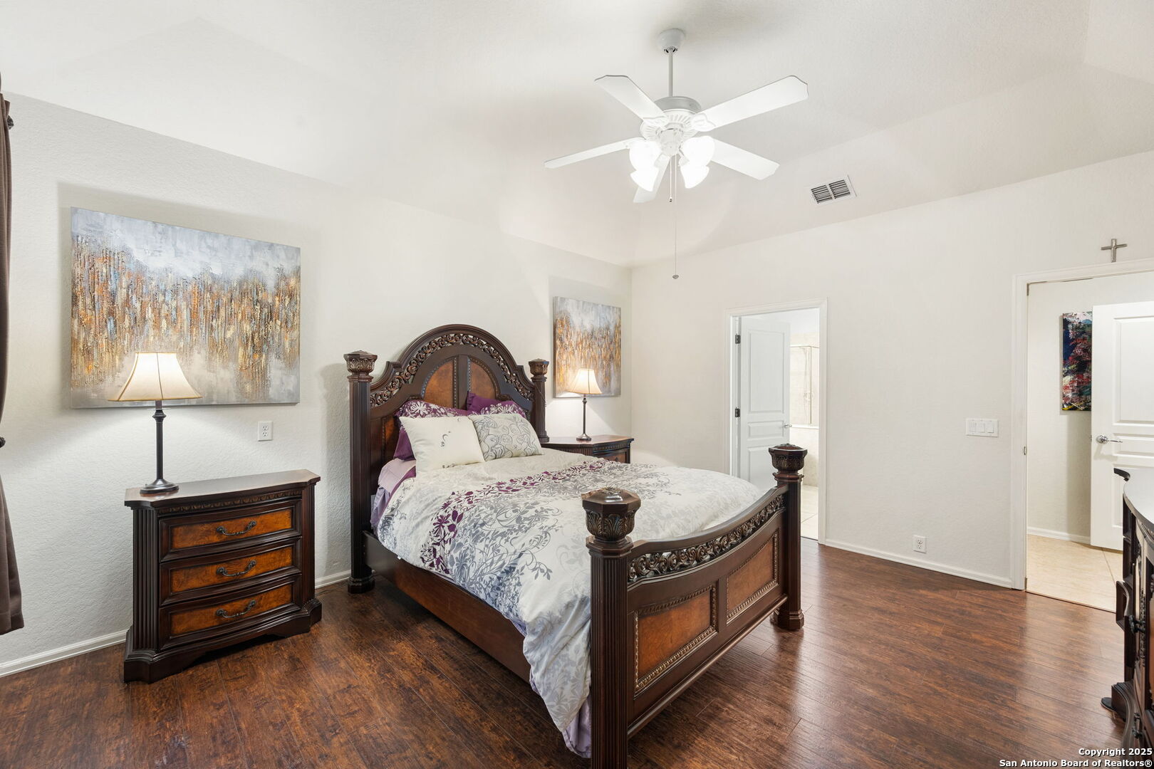 8206 Setting Moon San Antonio, TX 78255 - Photo 31 of 36 a bedroom with a bed and a chandelier