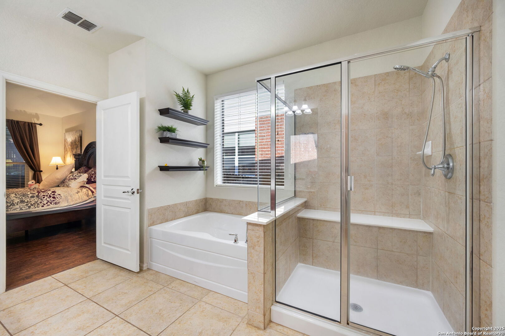 8206 Setting Moon San Antonio, TX 78255 - Photo 32 of 36 a bathroom with a tub and shower