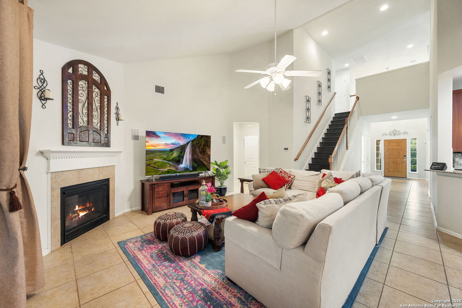 8206 Setting Moon San Antonio, TX 78255 - Photo 4 of 36 a living room with furniture fireplace and flat screen tv