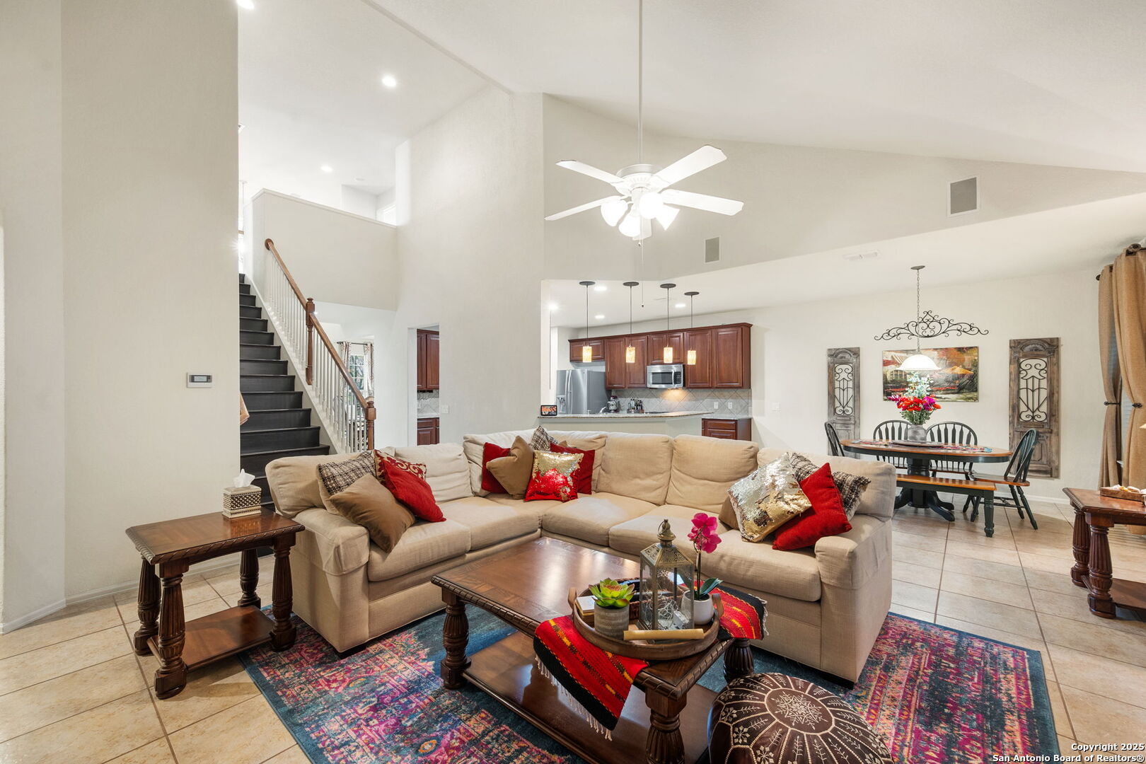 8206 Setting Moon San Antonio, TX 78255 - Photo 5 of 36 a living room with furniture kitchen view and a chandelier