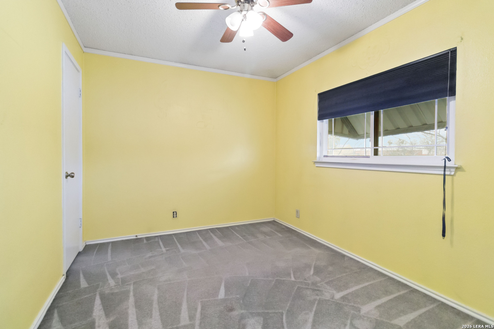 423 Rosa Verde San Antonio, TX 78207 - Photo 8 of 12 a view of room with a ceiling fan