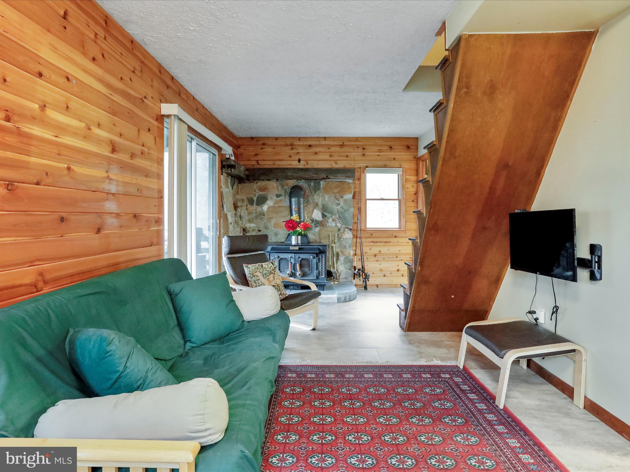 233 High Cliff Road Capon Bridge, WV 26711 - Photo 23 of 42 Main Living area w/wood stove