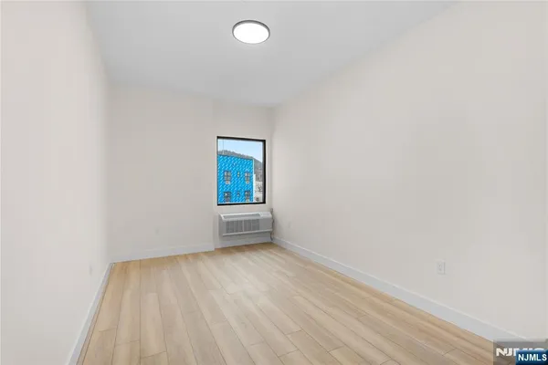 a view of an empty room and window