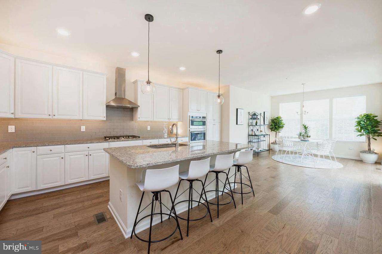 427 Lee Place Exton, PA 19341 - Photo 12 of 33 Modern kitchen with sleek design and light.