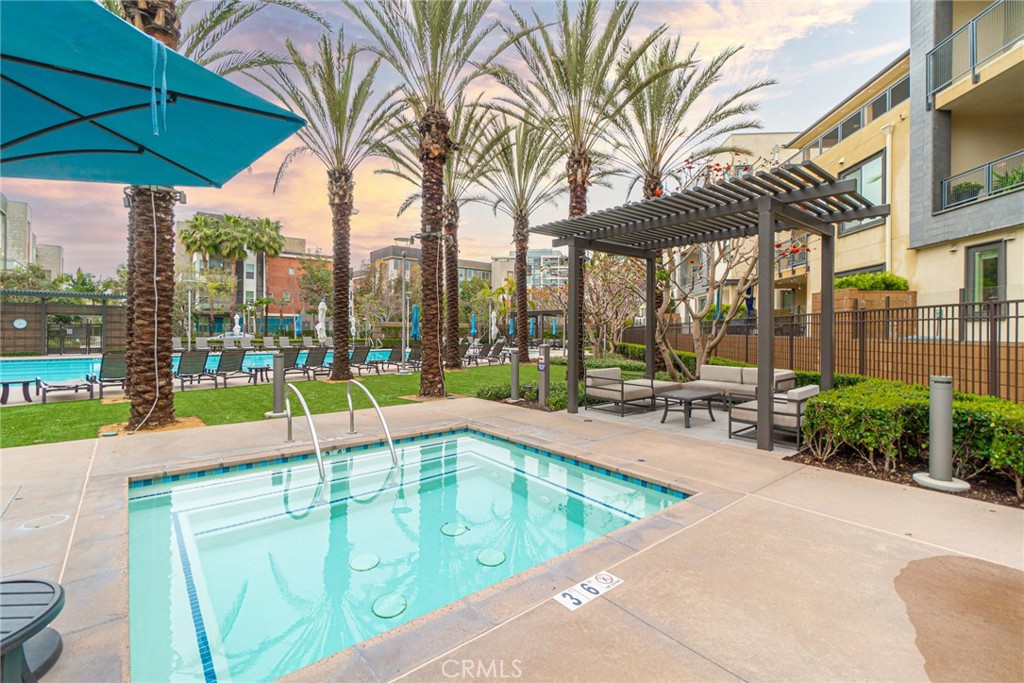 185 Tribeca Irvine, CA 92612 - Photo 45 of 55 a view of swimming pool with outdoor seating