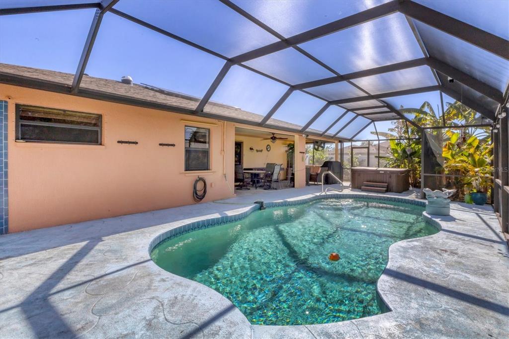 7047 Adderly Road Englewood, FL 34224 - Photo 2 of 39 a view of a porch