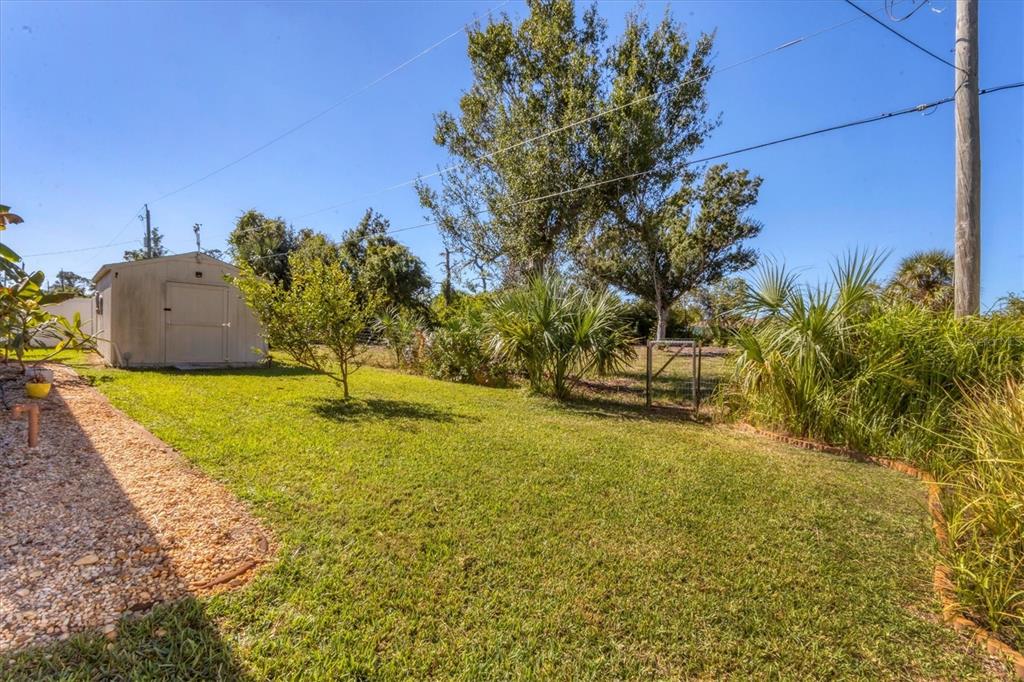 7047 Adderly Road Englewood, FL 34224 - Photo 32 of 39 a view of swimming pool with an outdoor space