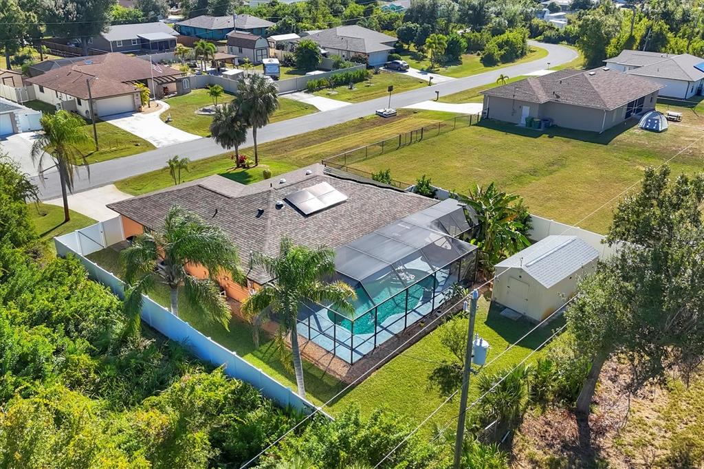 7047 Adderly Road Englewood, FL 34224 - Photo 33 of 39 an aerial view of residential houses with outdoor space