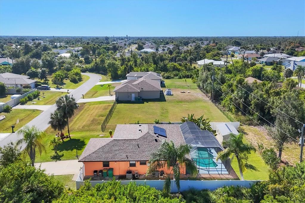 7047 Adderly Road Englewood, FL 34224 - Photo 36 of 39 an aerial view of residential houses with outdoor space and trees