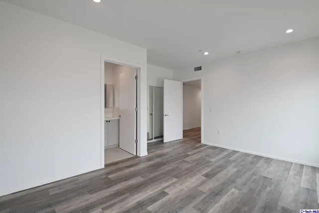 a view of a street with a building in the background