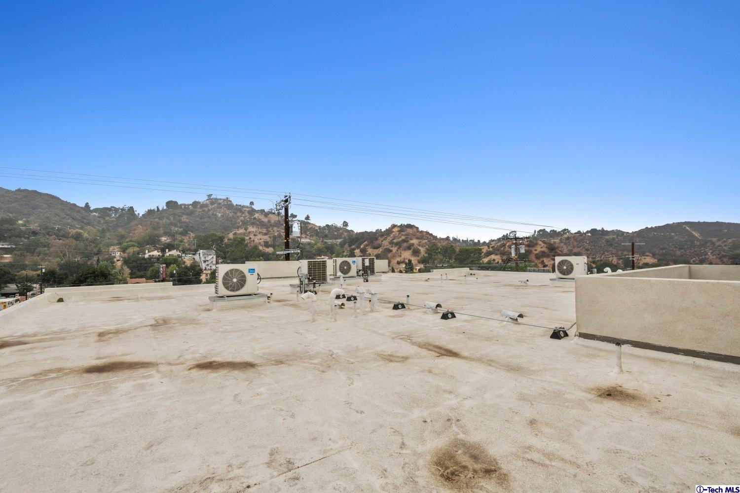 7064 Greeley Street, Unit 105 Tujunga, CA 91042 - Photo 41 of 46 a view of lake view and mountain view