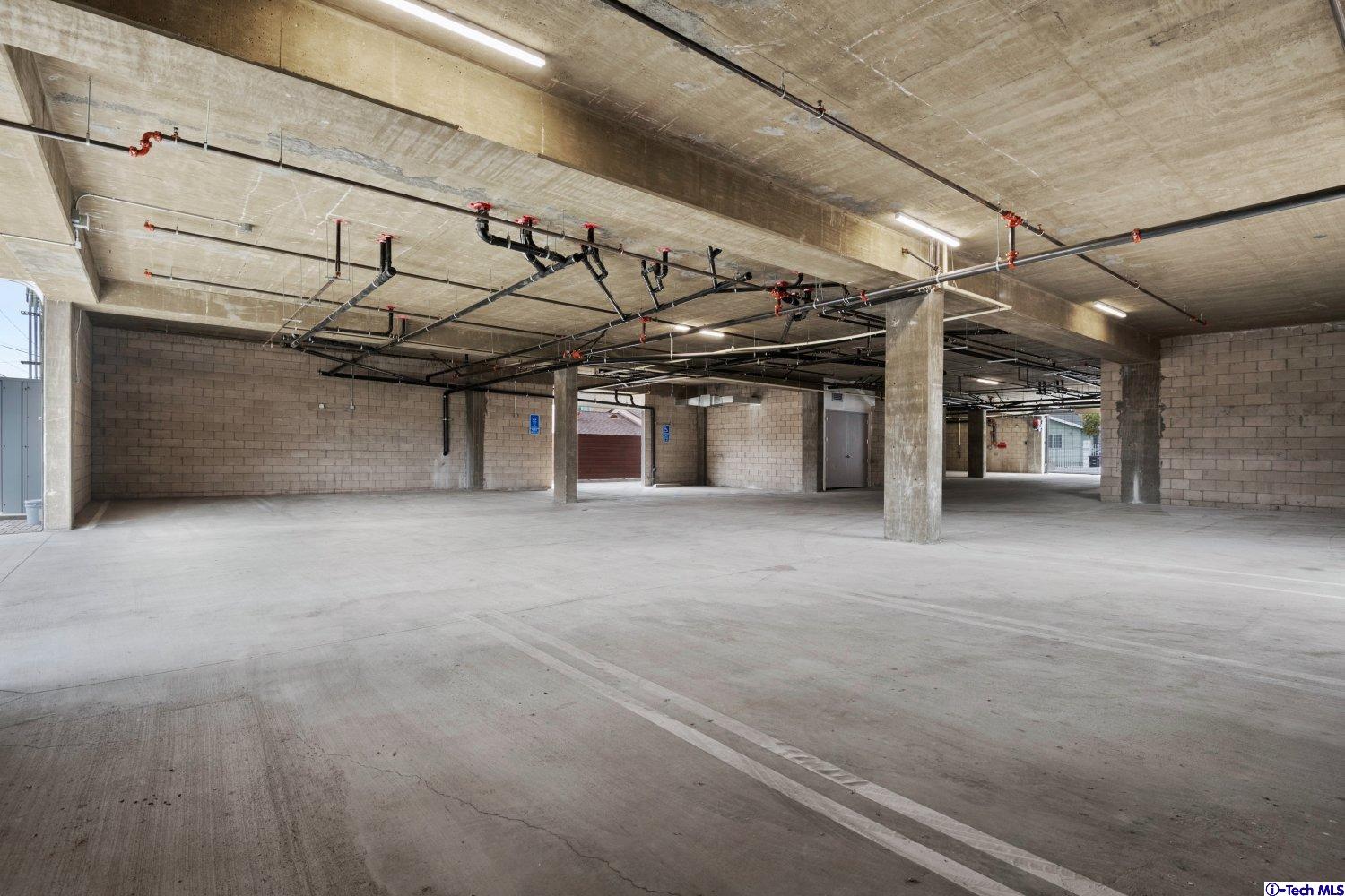7064 Greeley Street, Unit 105 Tujunga, CA 91042 - Photo 8 of 46 a view of a garage