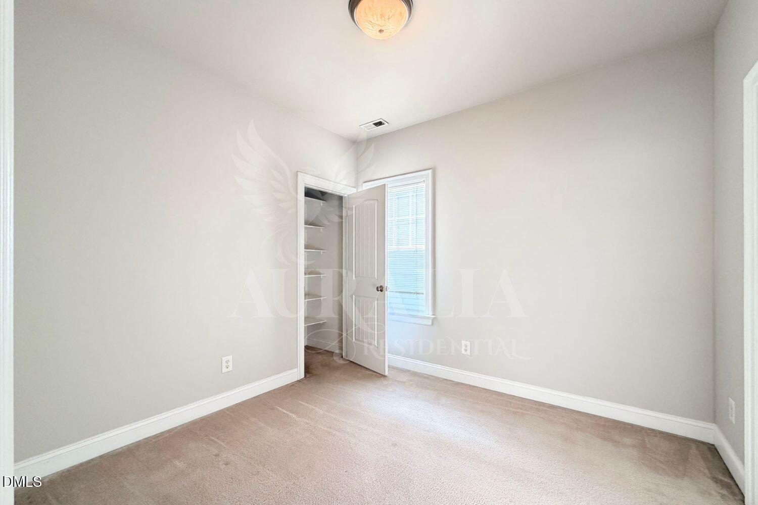 7754 ACC Boulevard Raleigh, NC 27617 - Photo 19 of 41 a view of an empty room