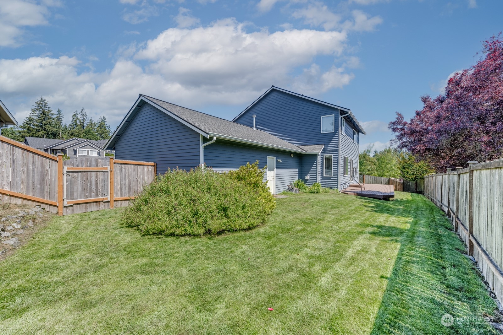 20523 2nd Drive Southeast Bothell, WA 98012 - Photo 6 of 37 a view of a house with backyard and garden