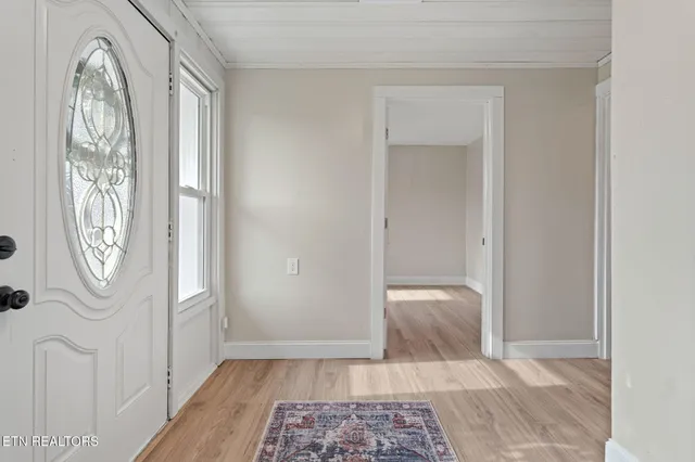 a bathroom with a toilet a sink a mirror and shower