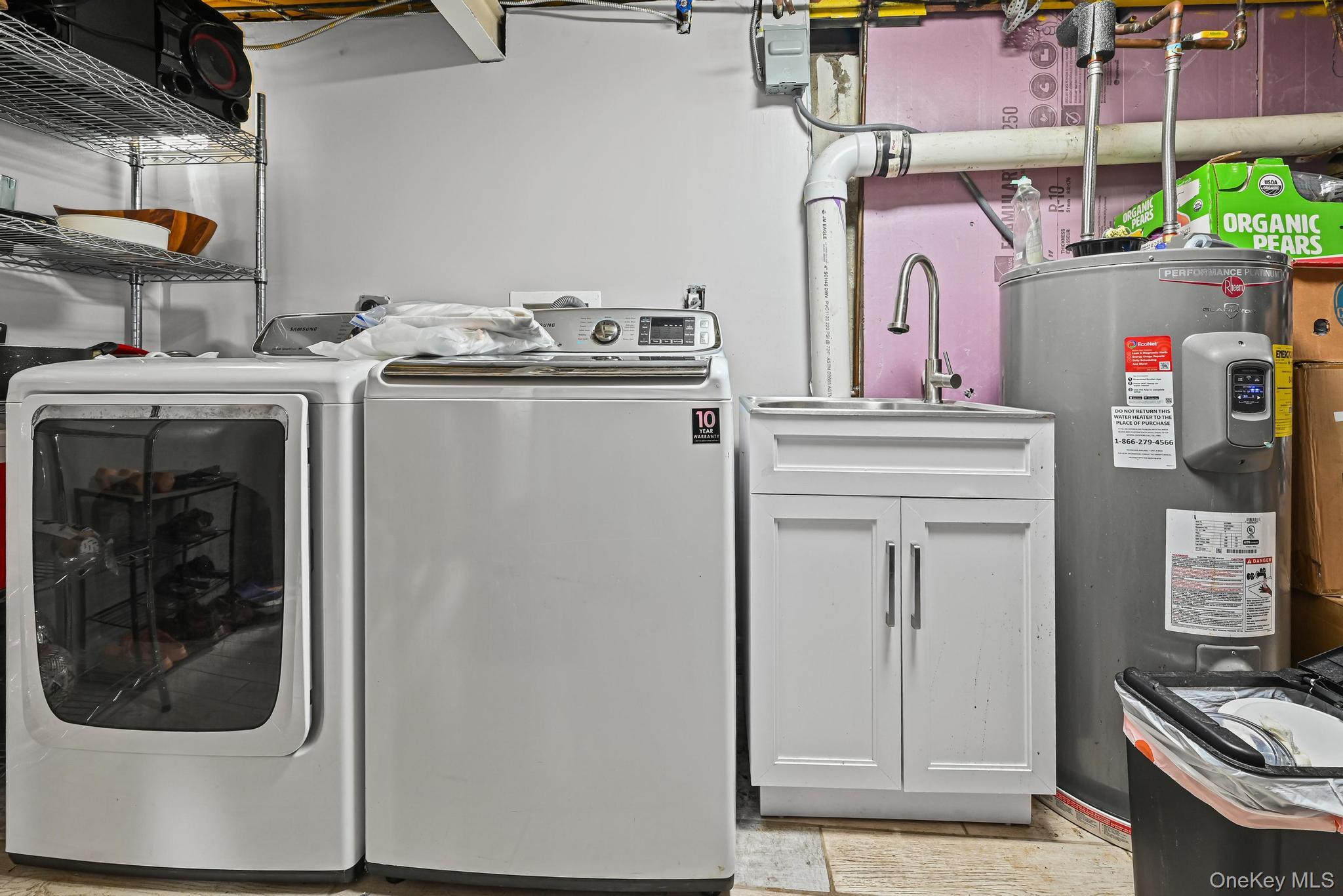 49 Ashley Drive Valley Stream, NY 11580 - Photo 16 of 29 a utility room with dryer and washer