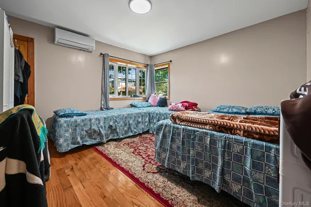 a living room with furniture fireplace and flat screen tv