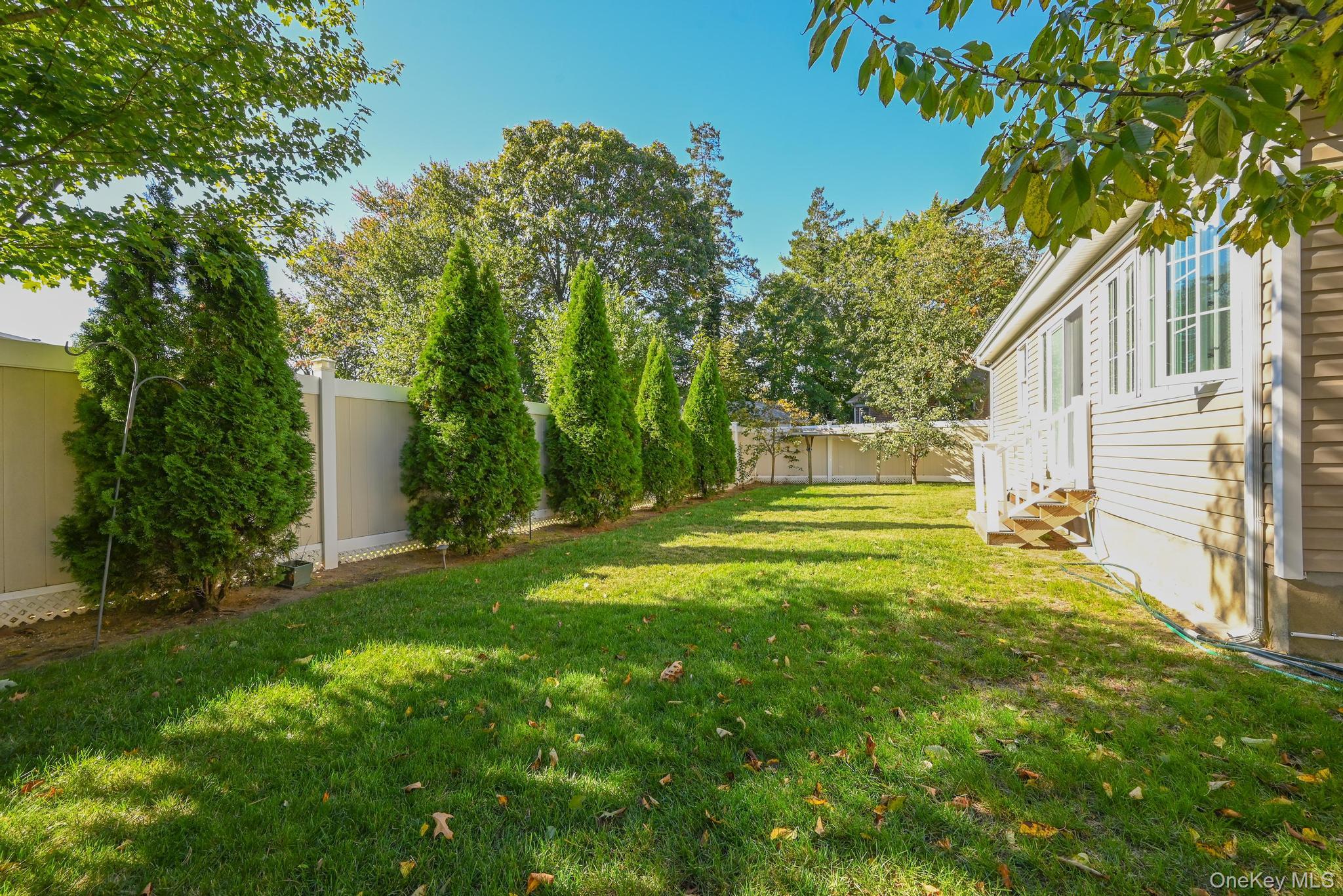 49 Ashley Drive Valley Stream, NY 11580 - Photo 6 of 29 a view of a house with a yard