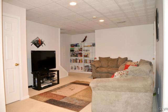 2617 Rising Sun Road Slatington, PA 18080 - Photo 32 of 40 Finished Lower Level: Family Room - door at right