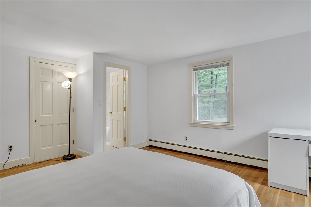 32 Dewey Road Lexington, MA 02420 - Photo 23 of 32 a bedroom with a bed and a window