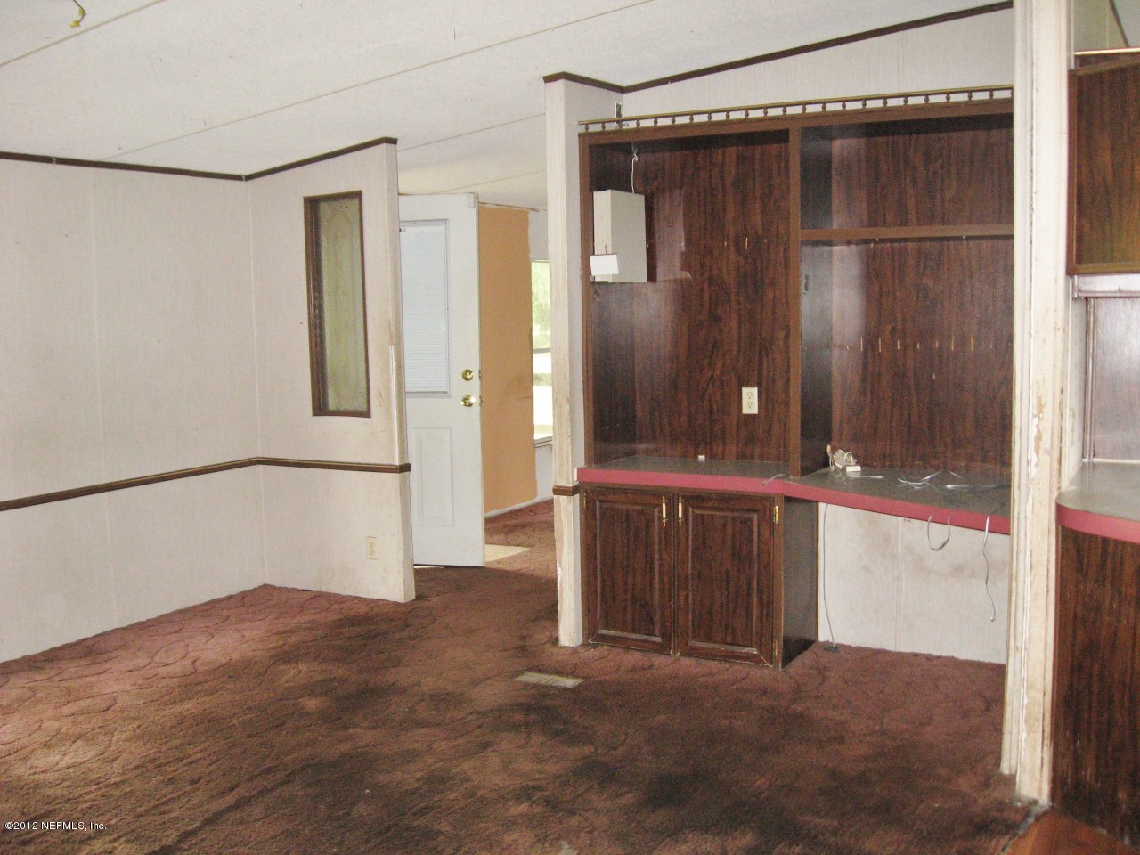 100 Yearling Road Interlachen, FL 32148 - Photo 13 of 20 Built-in Cabinet in living room