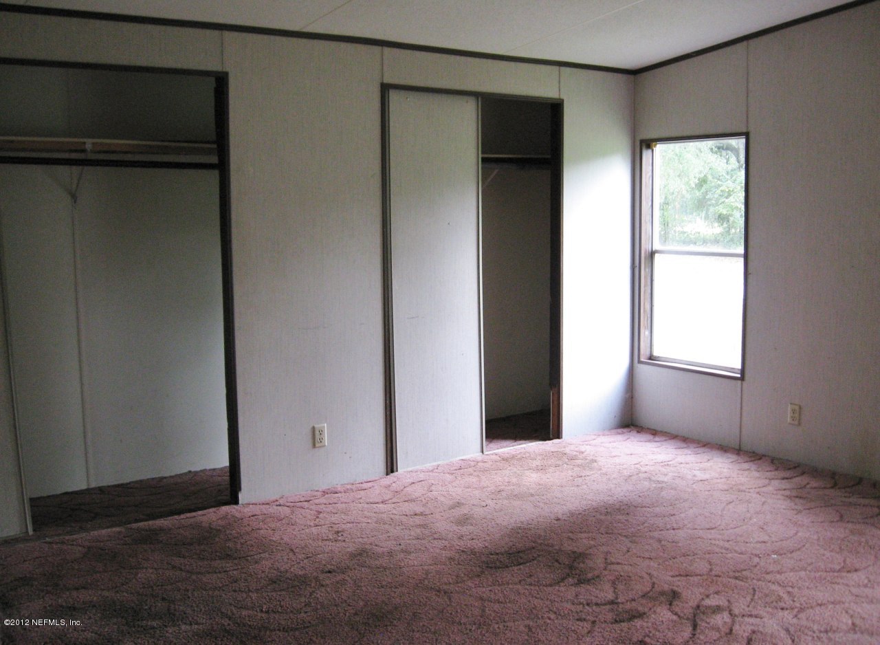 100 Yearling Road Interlachen, FL 32148 - Photo 10 of 20 Master Bedroom with 2 Closets