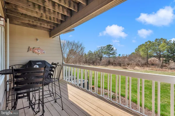 an aerial view of a house with outdoor space